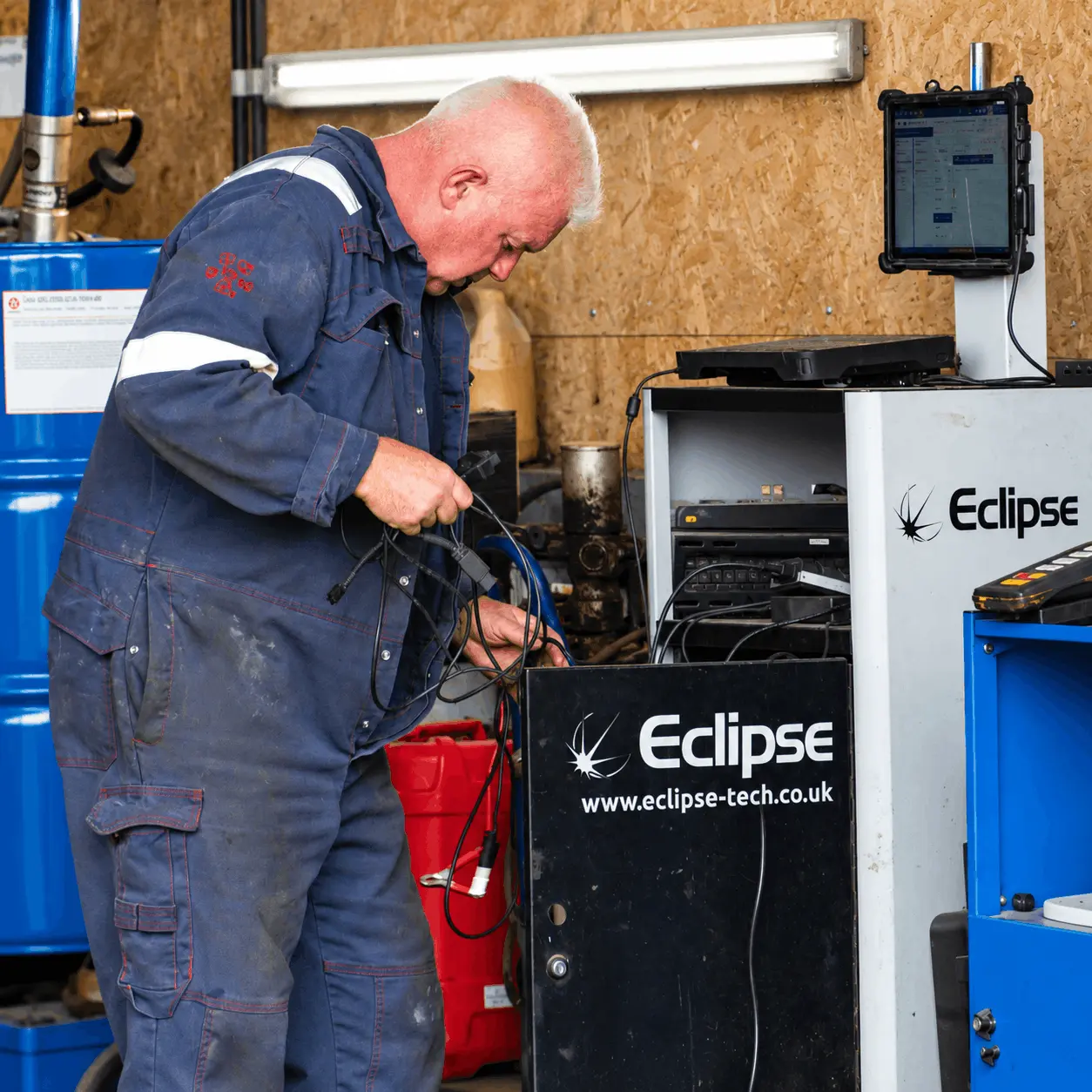 Mechanic Connecting Eclipse Diagnostic Cables